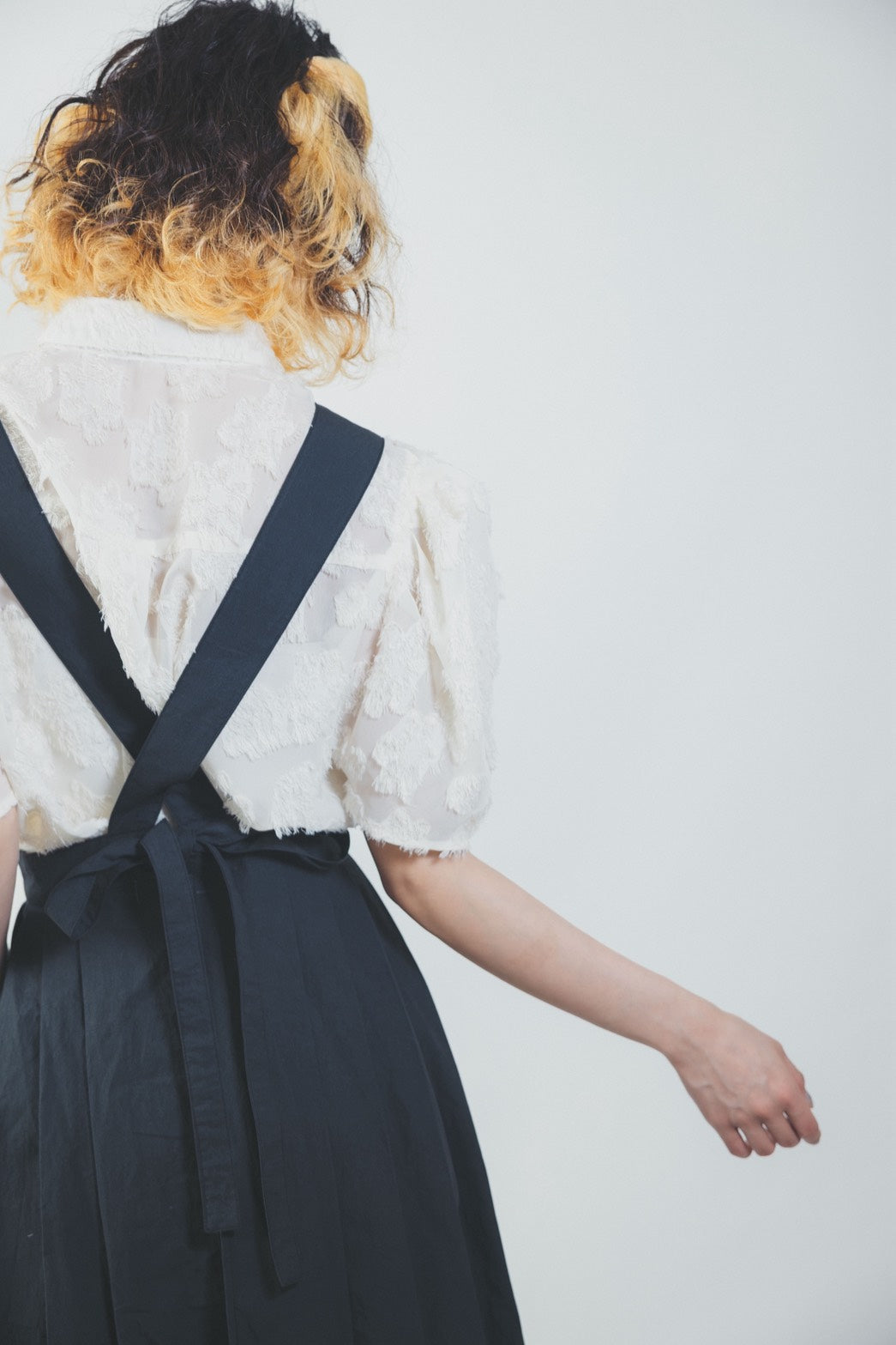 PLEATS APRON